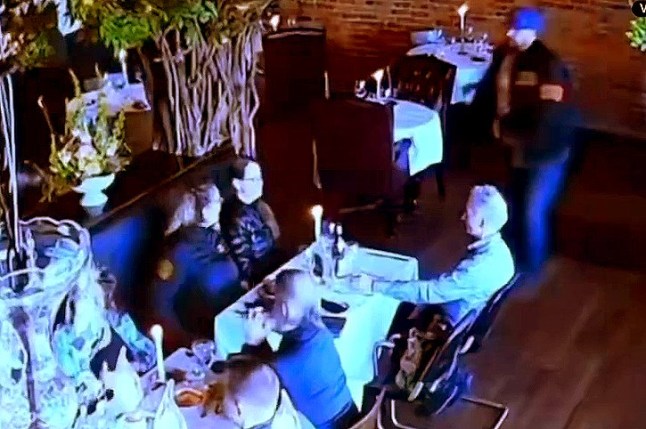 Moment waiter tackles lawyer trying to shoot ex-wife at point-blank range