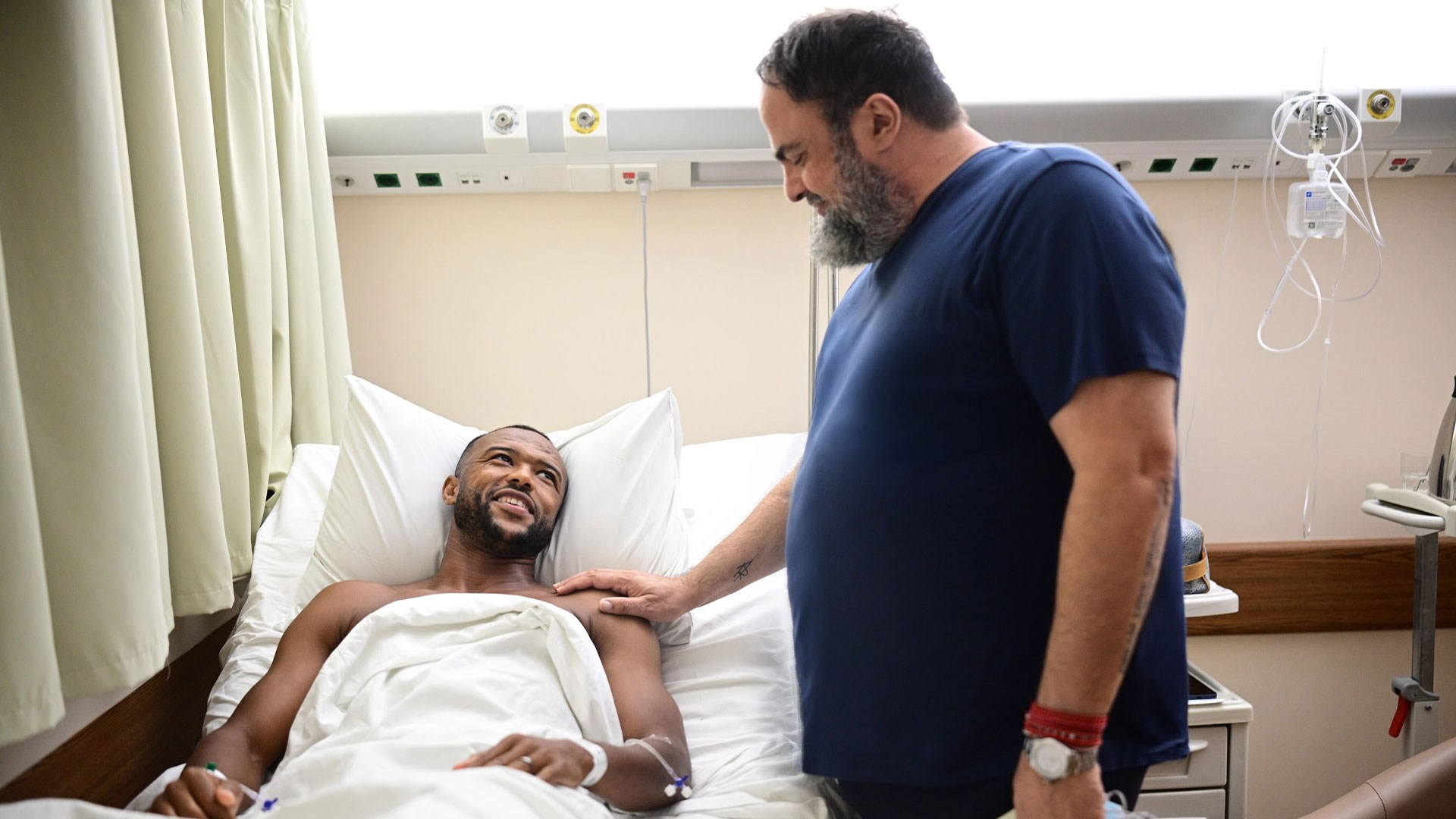 Nottingham Forest owner Evangelos Marinakis visits stricken Olympiacos star in hospital after injury left him in tears