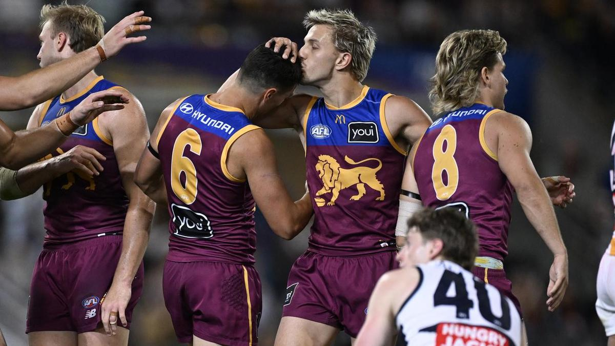 Old-fashioned spray sparks life into AFL three-peat
