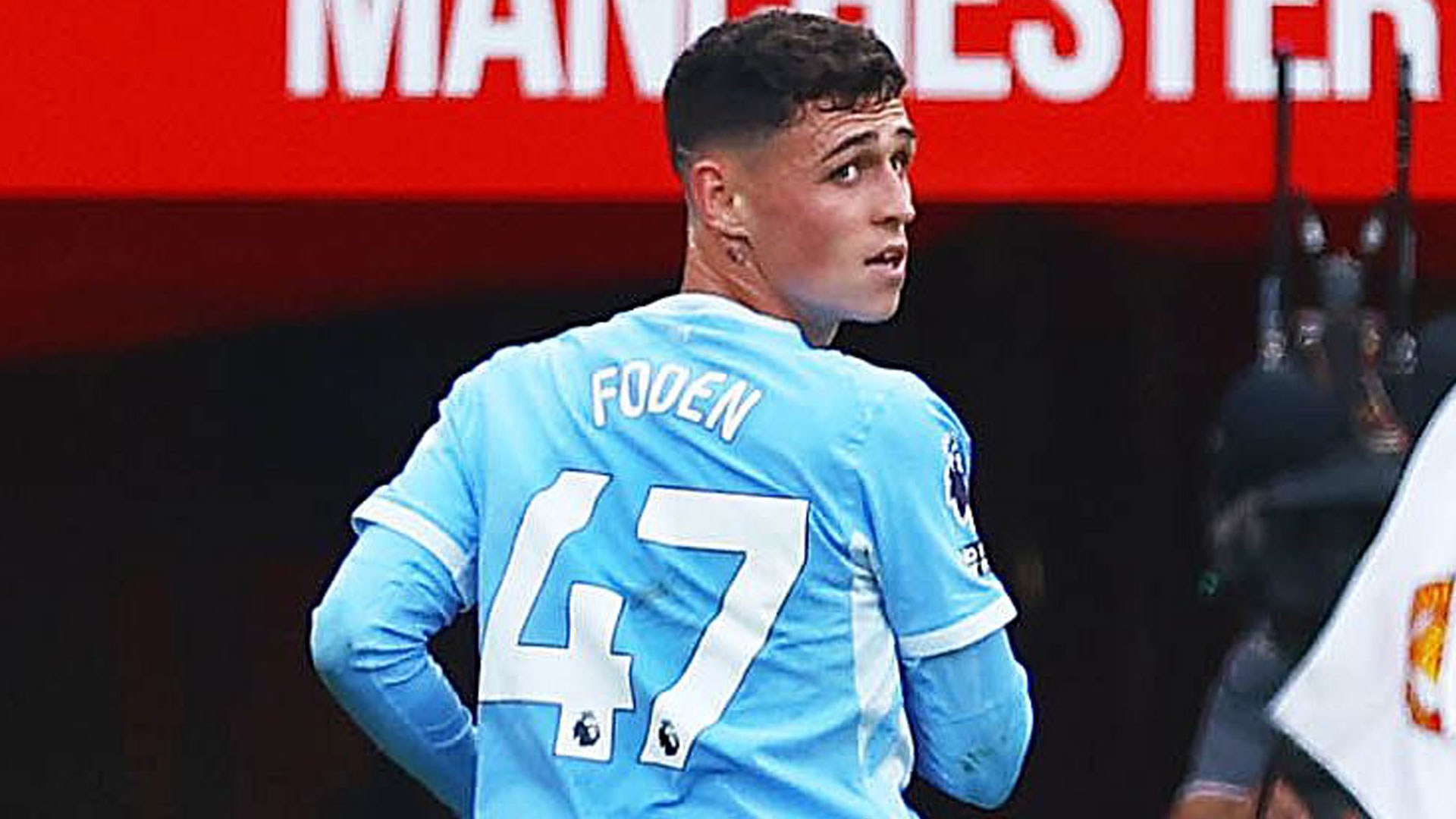 Phil Foden taunts Man Utd fans as he leaves Old Trafford after being sent off in Manchester derby