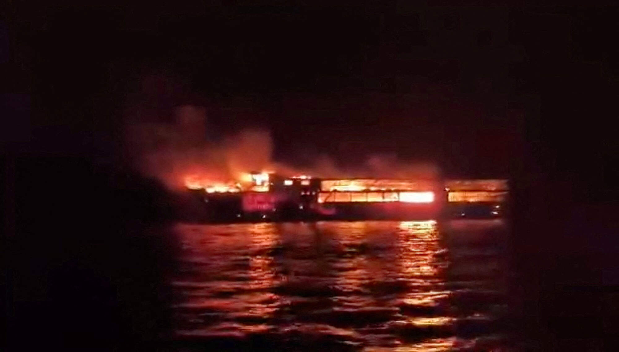 Philippine ferry fire kills five and leaves dozens of passengers missing