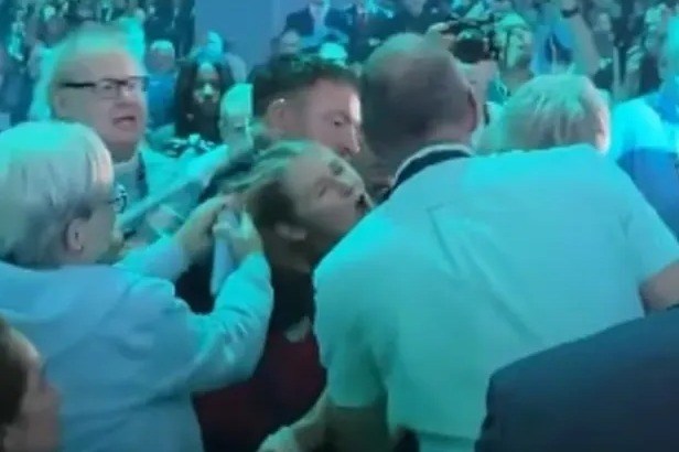 Police probe after anti-Reform protester ‘has hair pulled & is manhandled as she was thrown out of party conference’