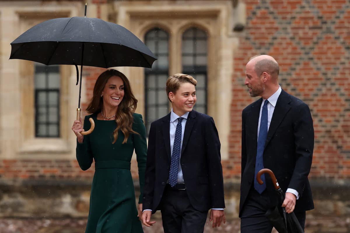 Prince George beams as he arrives for first day at Eton College and gets words of advice from headmaster