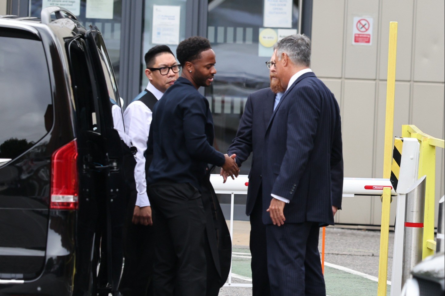 Raheem Sterling arrives at court charged with dangerous driving and possessing laughing gas after crashing £270k Lambo