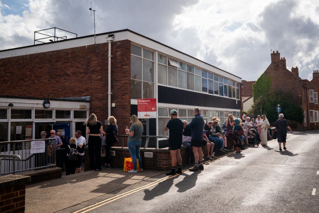 Royal Mail confirms 125 postcodes hit by delays AGAIN as Brits forced to queue for hours after six weeks without post