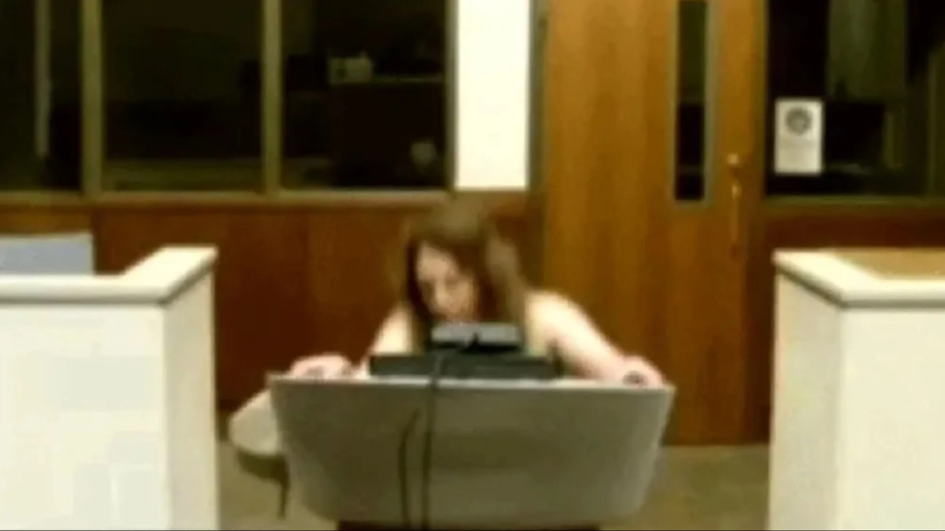 Shocking moment hospital worker faints in court after hearing he faces up to 100 years in prison for child sex crimes