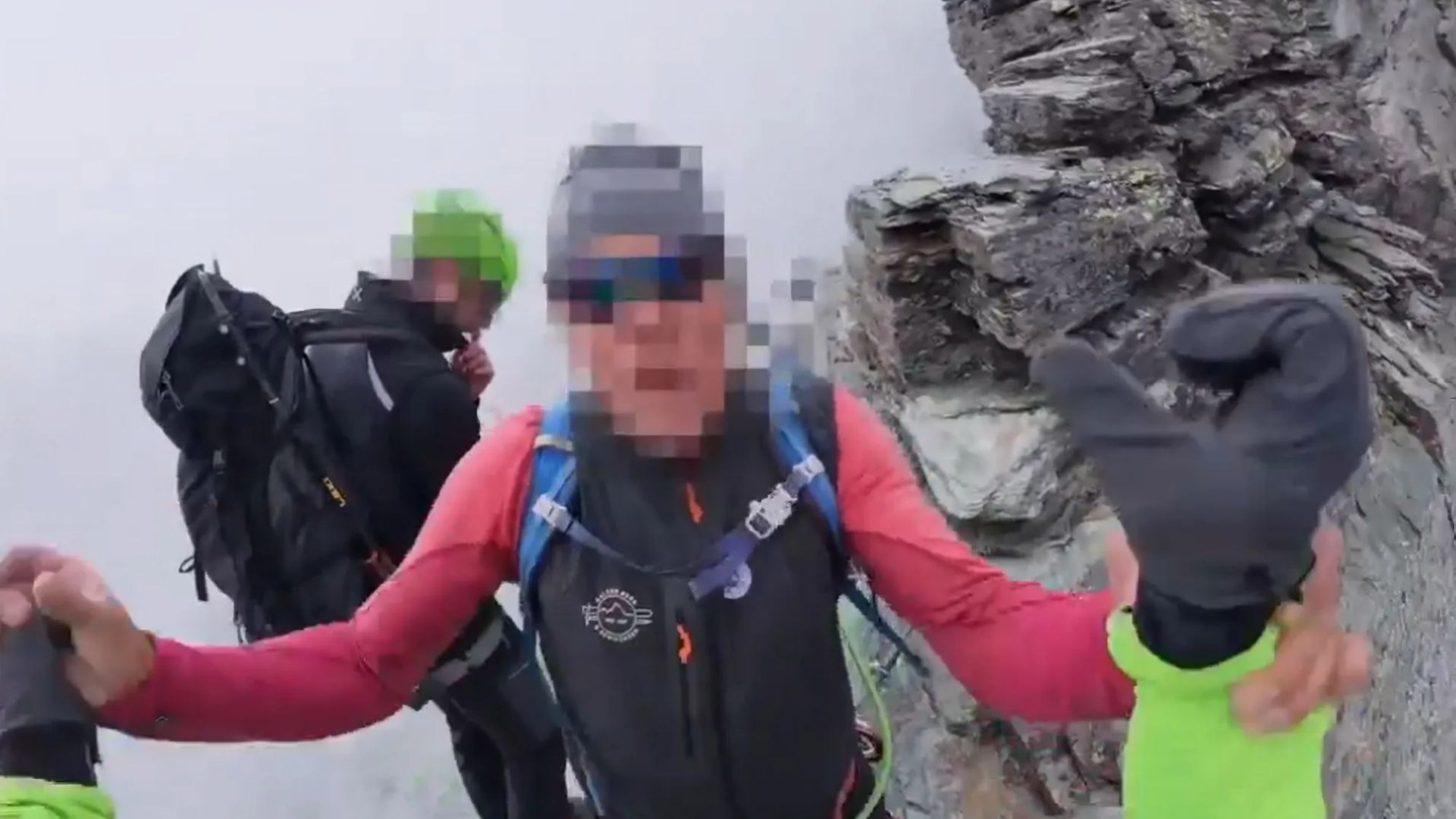 Shocking moment mountain guide attacks climber on tiny ledge at 10,000ft after confronting him for barging past wife