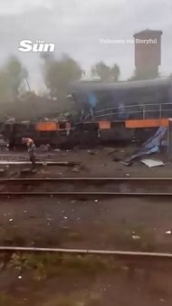 Shocking moment terrified passengers run for their lives as Russian drone ‘targeting Boris Johnson’s train’ strikes