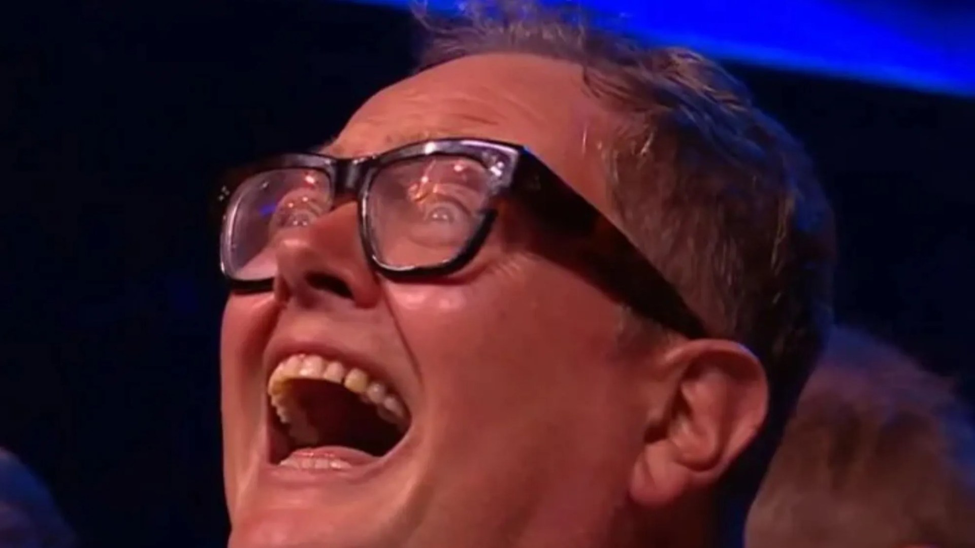 Stunned Alan Carr fights back tears as he’s surprised with top NTA honour and serenaded by Amanda Holden