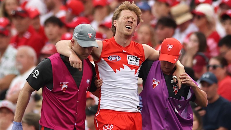 Swans fear worst after ‘devastating’ Mills injury tempers joy of epic victory over Lions