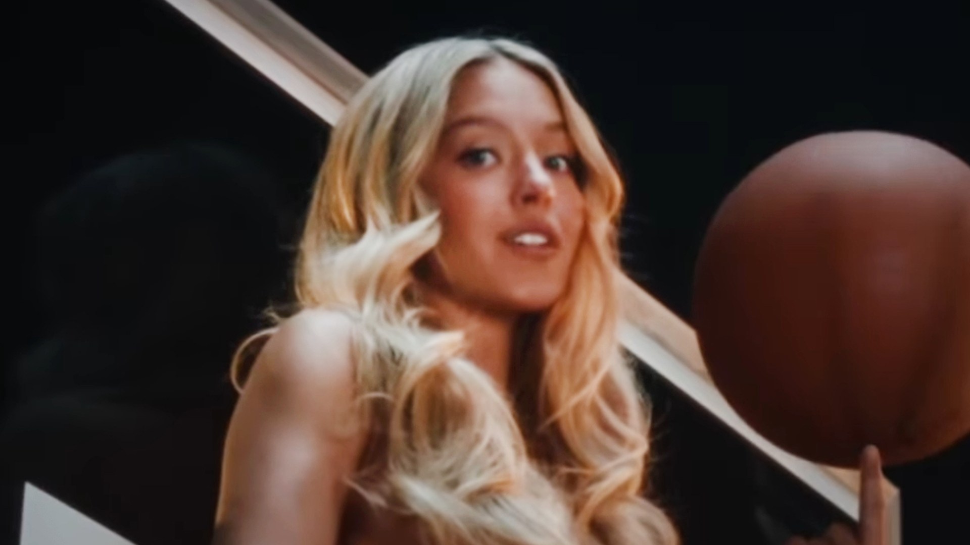 Sydney Sweeney shows off her ball skills in sexiest shoot EVER as she straddles basketball hoop naked