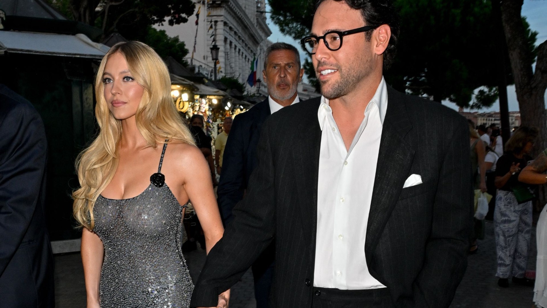 Sydney Sweeney steals show in see-through dress as she arrives at Armani party in Venice with boyfriend Scooter Braun