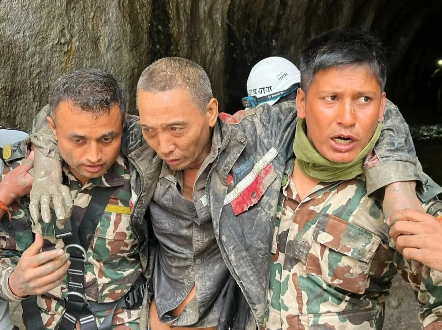 Third worker pulled ALIVE from Nepal tunnel and woman rescued from house 10 days after devastating floods hit region