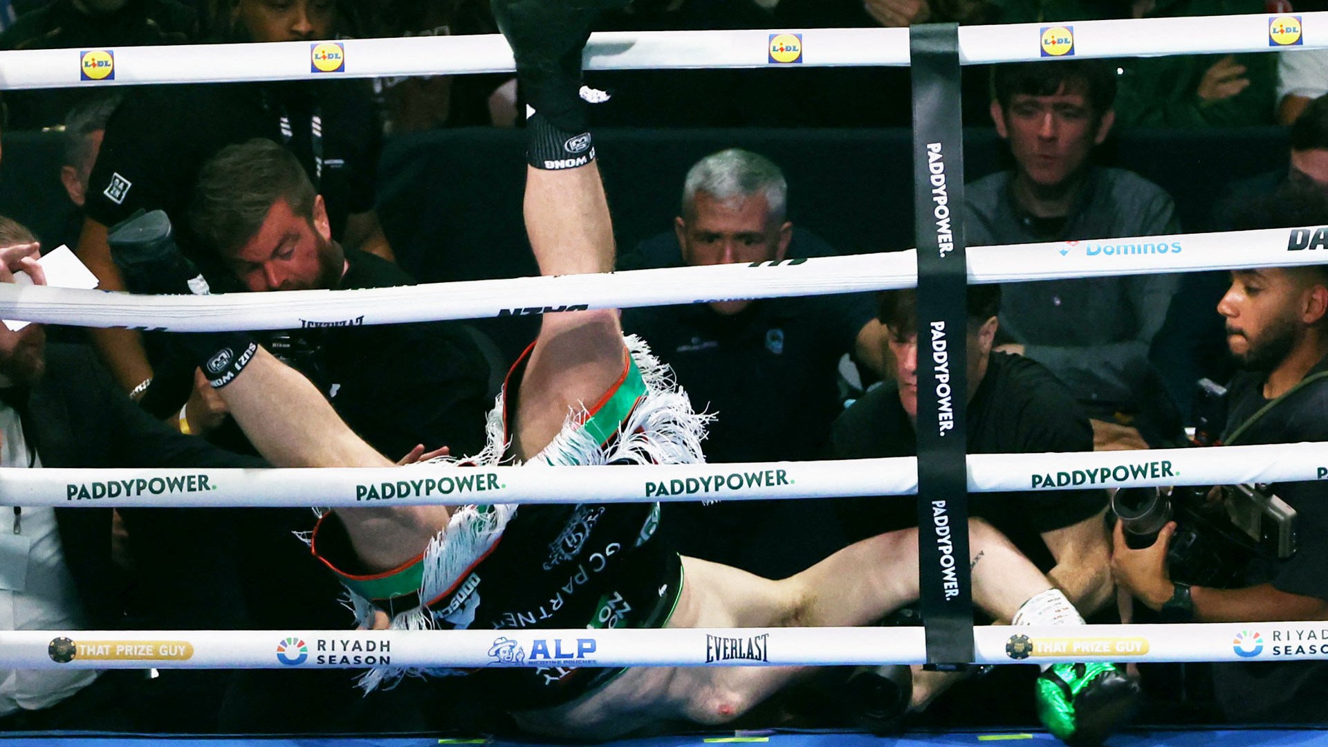 Thomas Carty hospitalised and undergoes brain scan after boxer sent crashing through ropes and smacks head on table