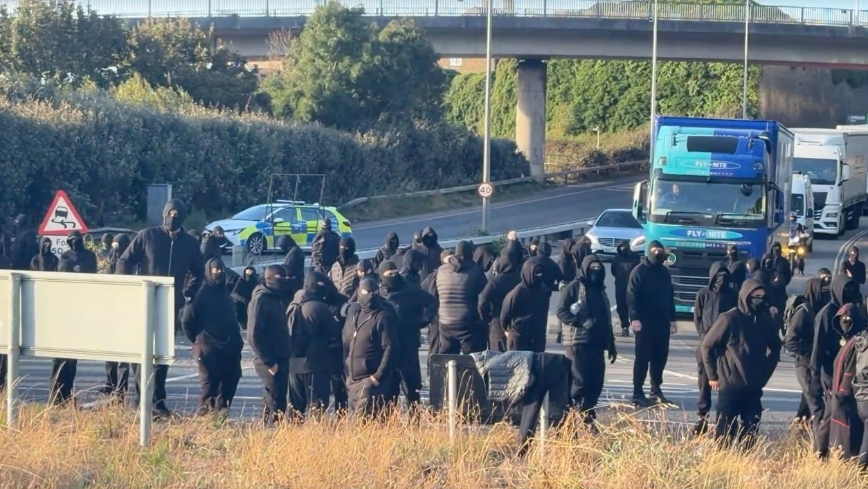 Tommy Robinson associate ‘behind hundreds of masked “stop the boats” protesters who brought Dover to a standstill’