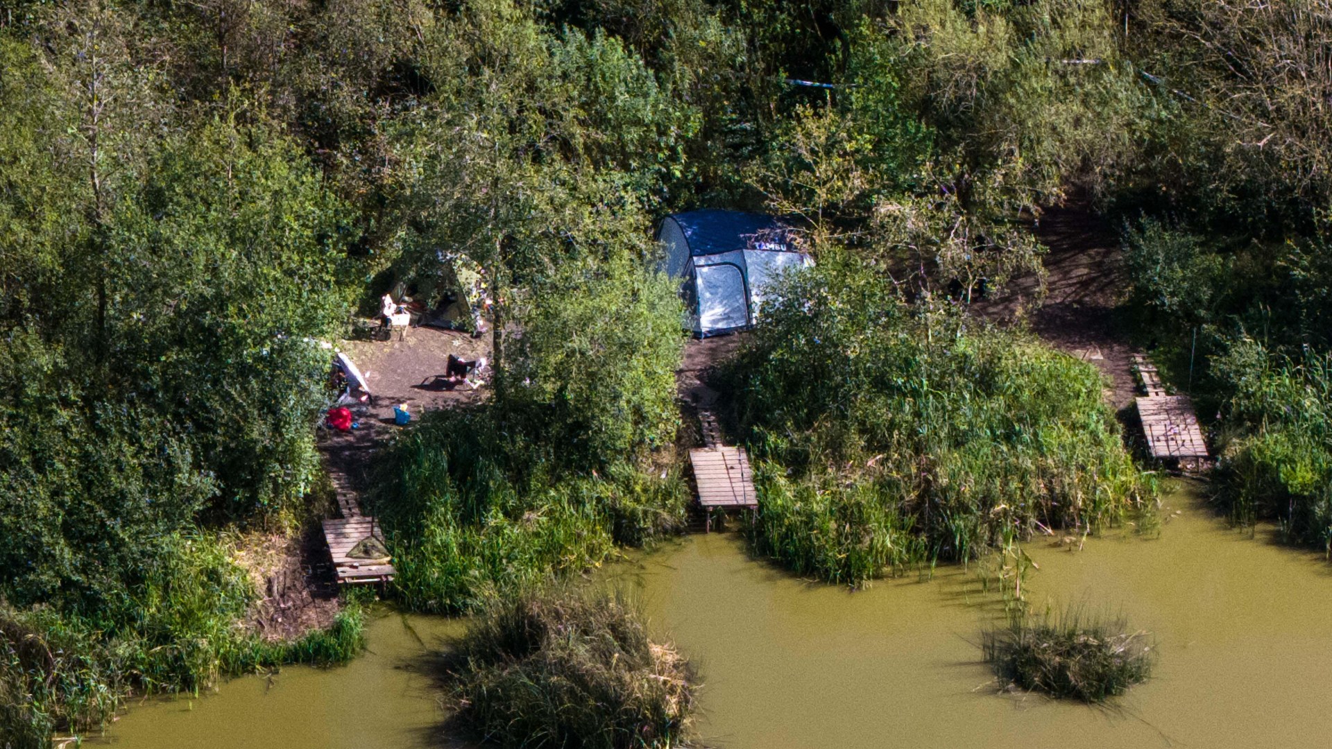 Two women and two men arrested over ‘murder’ of three-month-old baby girl near UK fishing lake