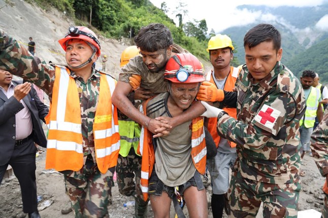 Two workers rescued alive from tunnel nine days after deadly flash flood in Nepal