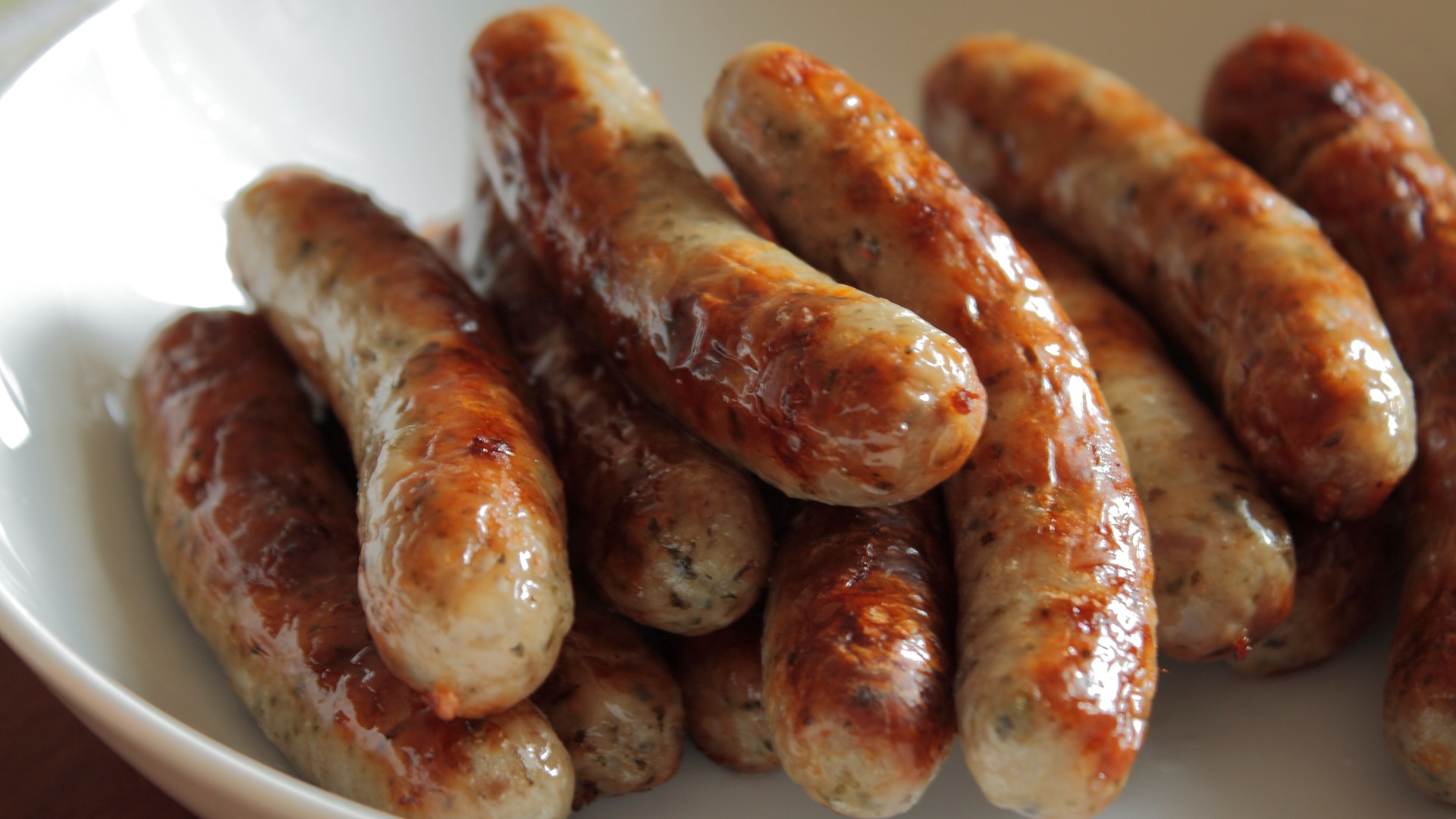 UK faces sausage shortage as workers at major supplier announce all-out strike in pay row