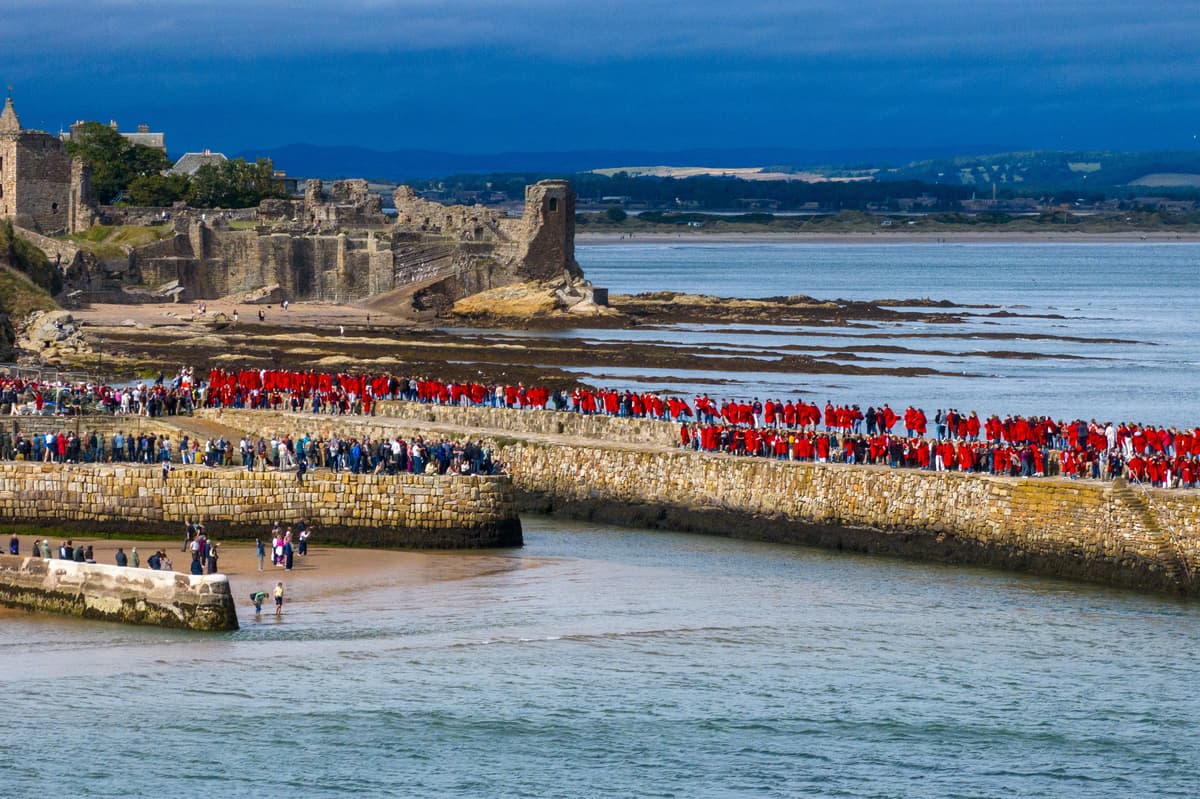 University of St Andrews students take part in traditional pier walk