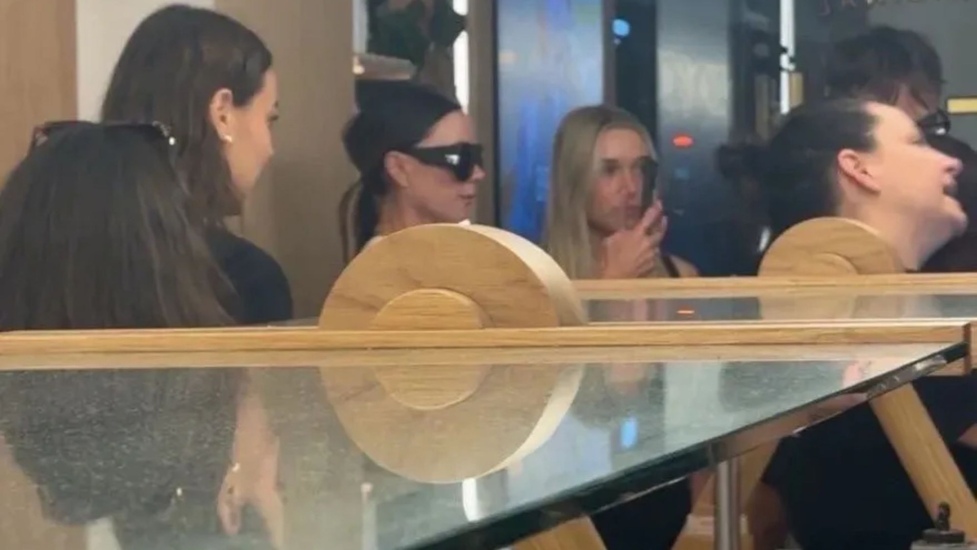 Victoria Beckham and daughter Harper spotted cooling off in frozen yogurt shop in London – would you have noticed?