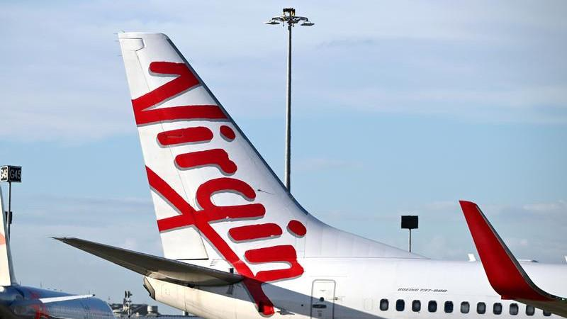 Virgin Australia Melbourne to Doha flight chaos as passengers restrain two men over alleged threats