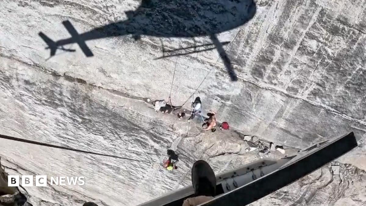 Watch: Helicopter hovers feet from cliff face during rescue