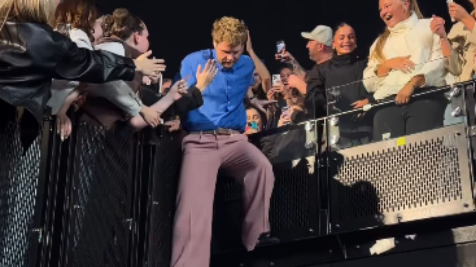 Watch the moment huge pop star suffers nasty fall during concert as fans gasp in shock