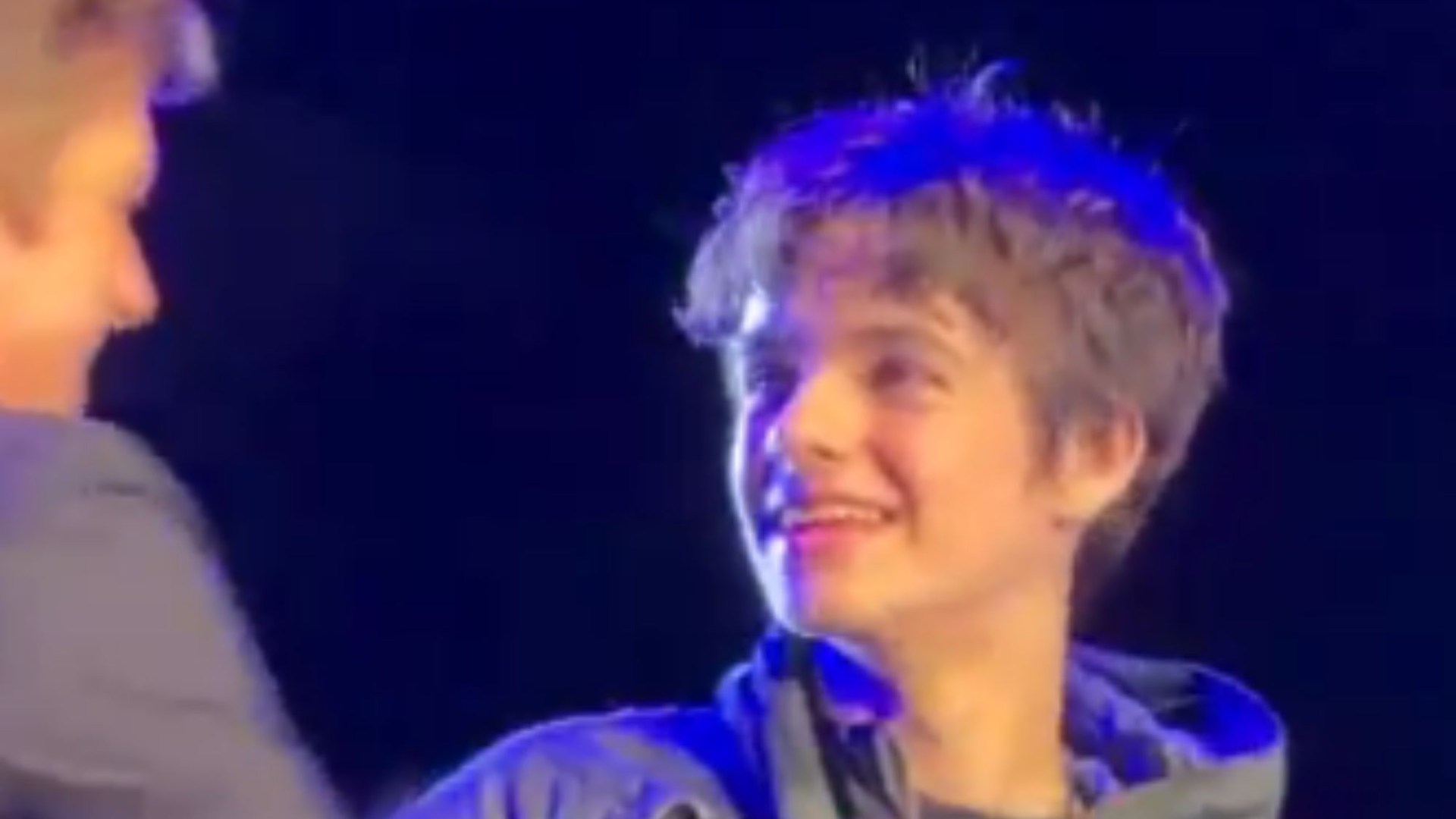Watch the moment nepo-baby, 15, joins his rockstar dad on stage to perform Oasis cover – can you guess who’s his parent?