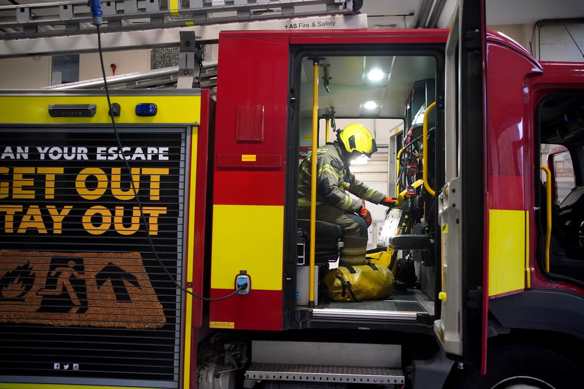 Woman and child flee burning flat as 70 firefighters tackle blaze in Poplar tower block