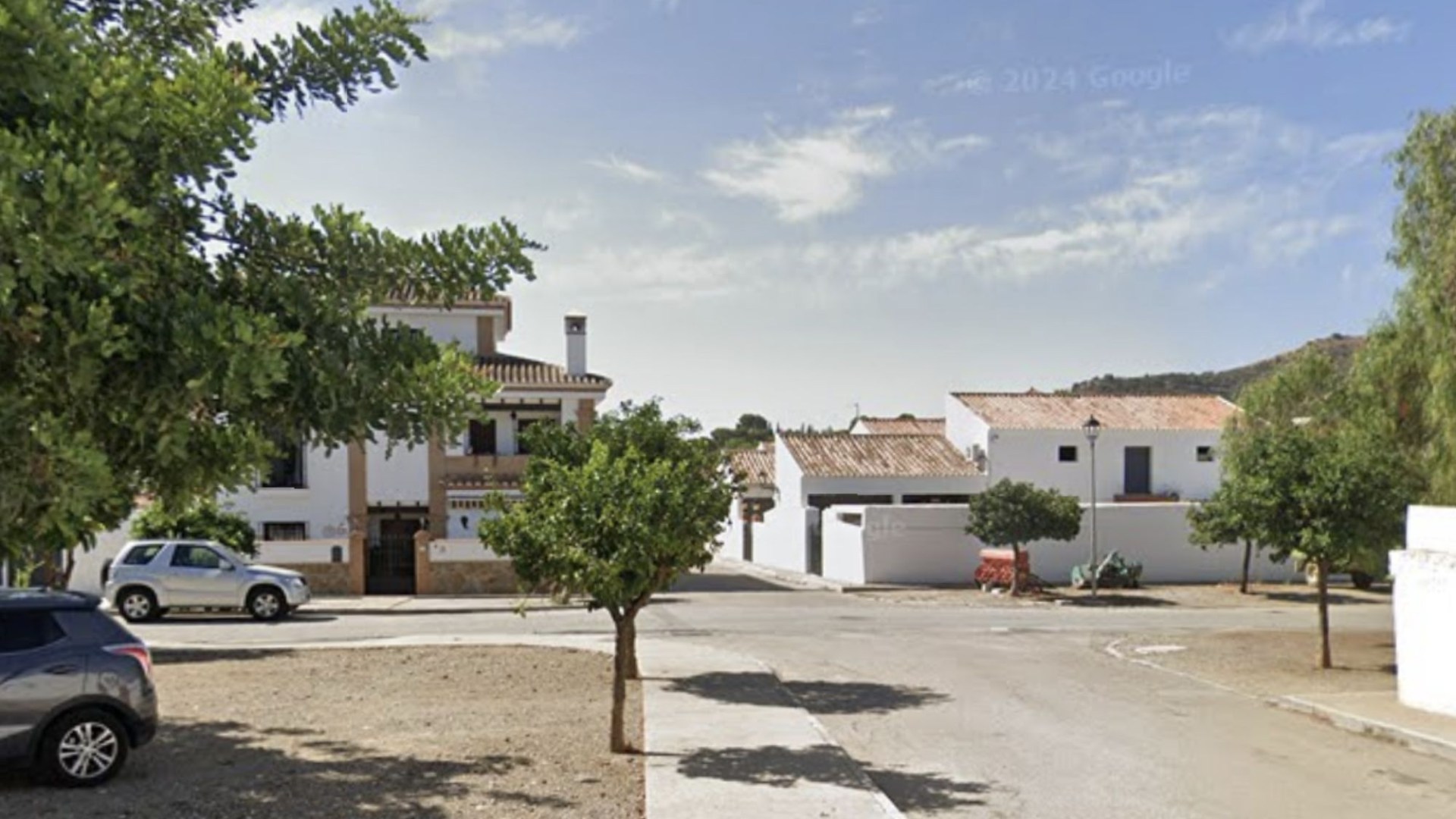 Woman arrested after man shot dead in middle of Costa del Sol street as children left fearing for their lives