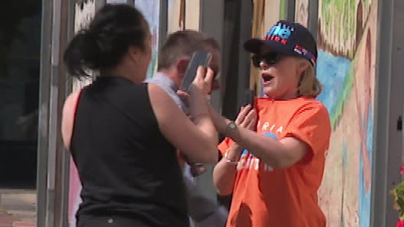 Woman pushed to ground in scuffle outside One Nation election event
