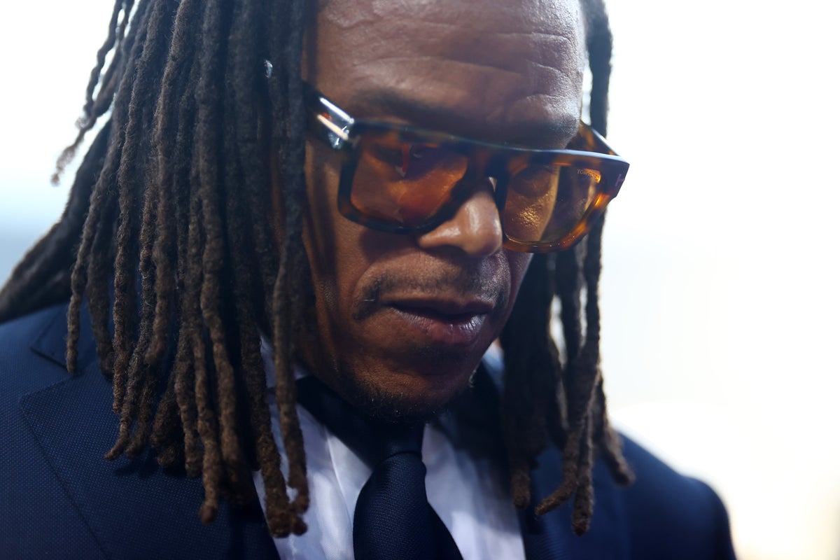 Woman who pawned Edgar Davids’ £118,000 art collection misses court after being ‘knocked out by luggage’