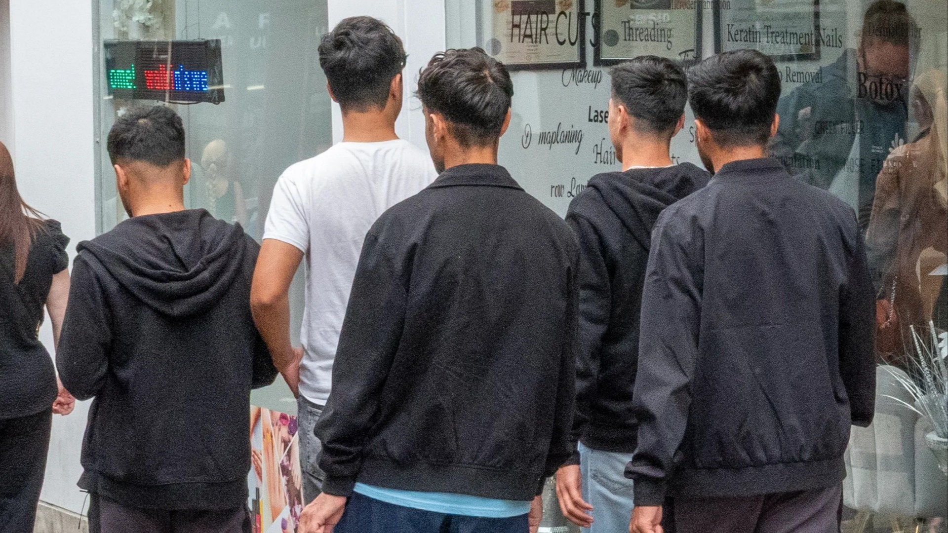 ‘It’s all young men… it’s intimidating’: Fear & fury in UK’s oldest town as dozens of migrants are bussed in every DAY