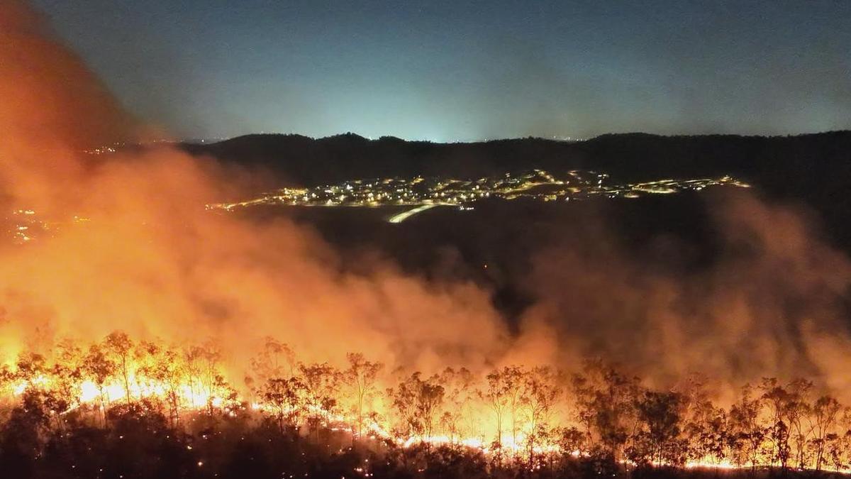 ‘Too bloody close’: Huge fire threatens homes near South Ripley, Ipswich